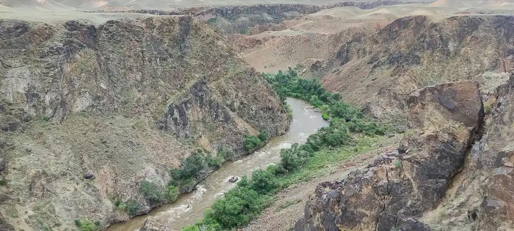 River winding through steep rocky canyon landscape